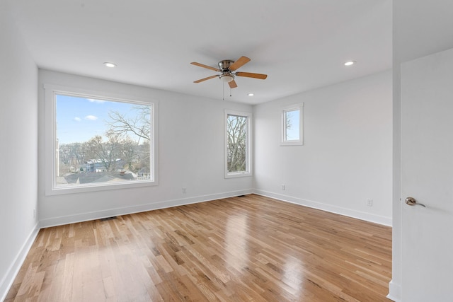 unfurnished room featuring recessed lighting, baseboards, light wood-style floors, and a ceiling fan