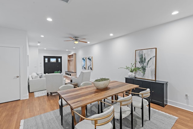 dining space featuring recessed lighting, light wood-style floors, baseboards, and ceiling fan