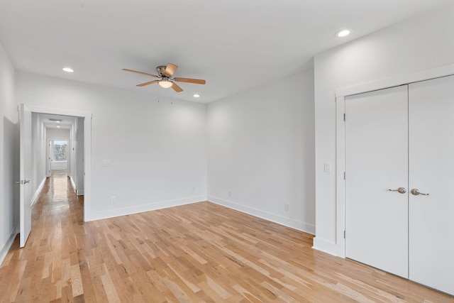 unfurnished bedroom with recessed lighting, light wood-style flooring, baseboards, and ceiling fan