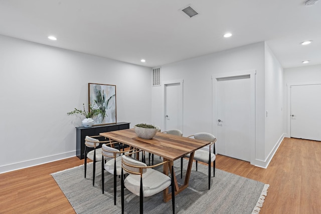 dining room featuring visible vents, recessed lighting, and light wood-style floors