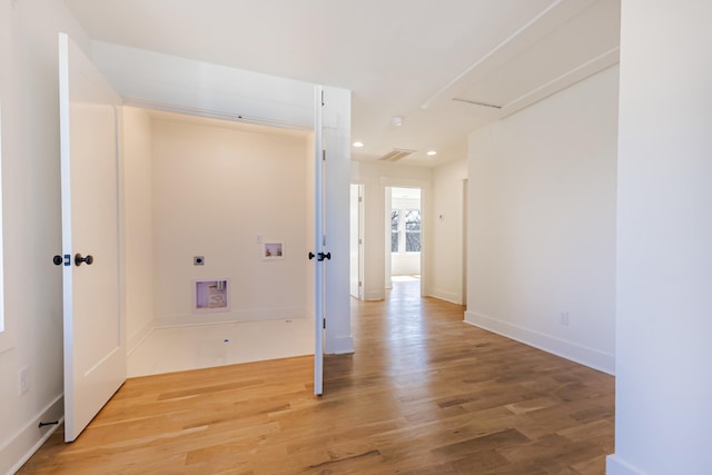 hall featuring recessed lighting, wood finished floors, and baseboards