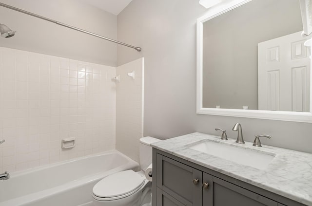 full bath featuring vanity, toilet, and shower / bath combination