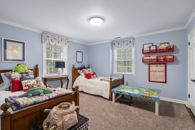 carpeted bedroom featuring crown molding and baseboards