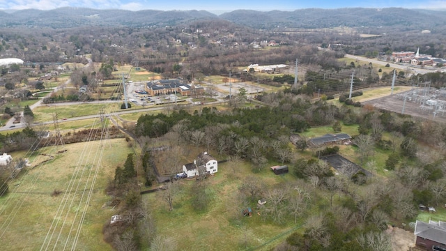 bird's eye view featuring a rural view and a mountain view