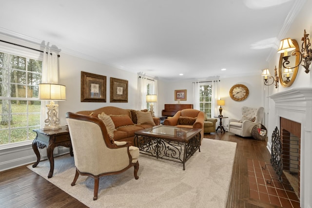 living area featuring recessed lighting, a fireplace with flush hearth, dark wood-style floors, and crown molding