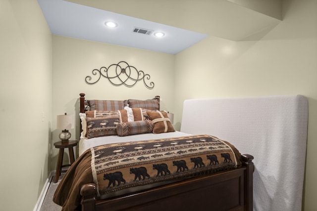 bedroom featuring recessed lighting, visible vents, baseboards, and carpet