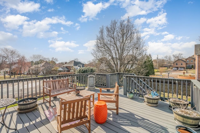 wooden deck with a residential view