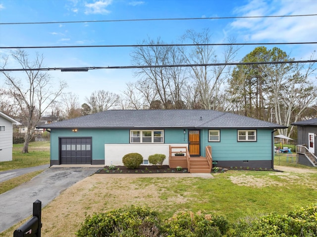 view of front of property featuring a garage, a front lawn, aphalt driveway, roof with shingles, and crawl space