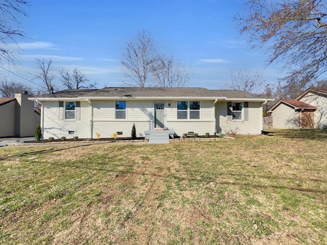 view of front facade featuring crawl space, brick siding, and a front lawn