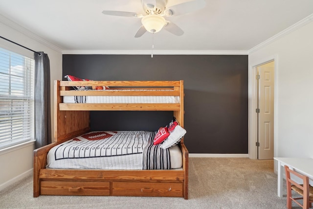 bedroom with baseboards, a ceiling fan, ornamental molding, and carpet flooring