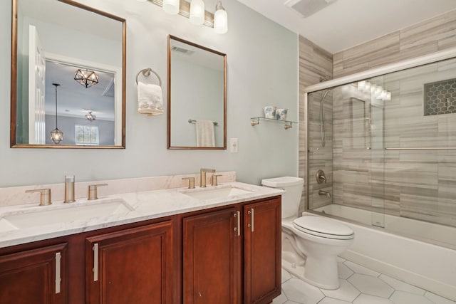 full bathroom with a sink, visible vents, and double vanity