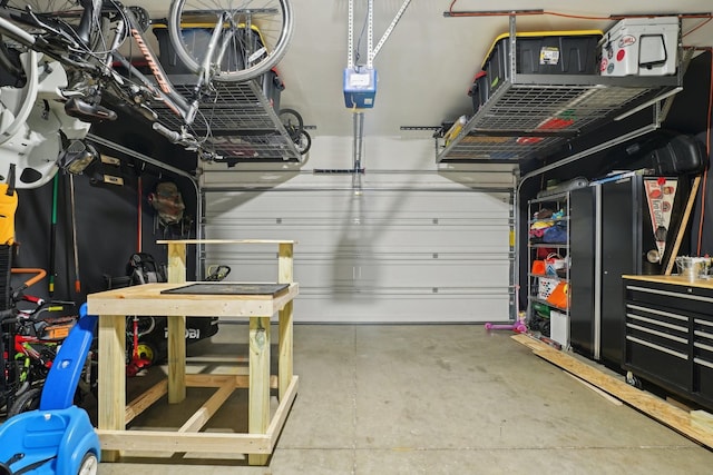 garage featuring a garage door opener