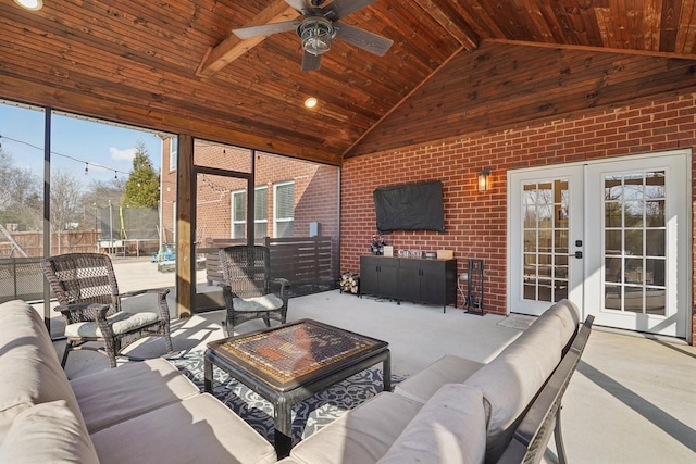 interior space with wooden ceiling, french doors, ceiling fan, and vaulted ceiling