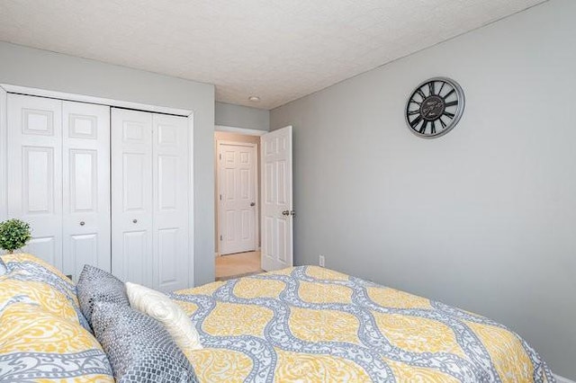 bedroom featuring a closet and a textured ceiling