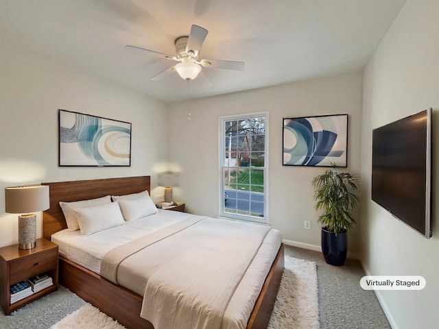 bedroom with carpet flooring, ceiling fan, and baseboards