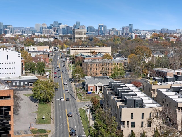 birds eye view of property featuring a view of city