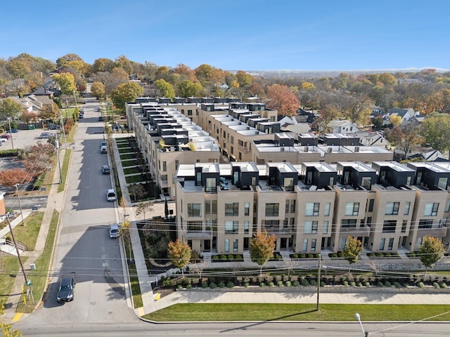 birds eye view of property with a residential view