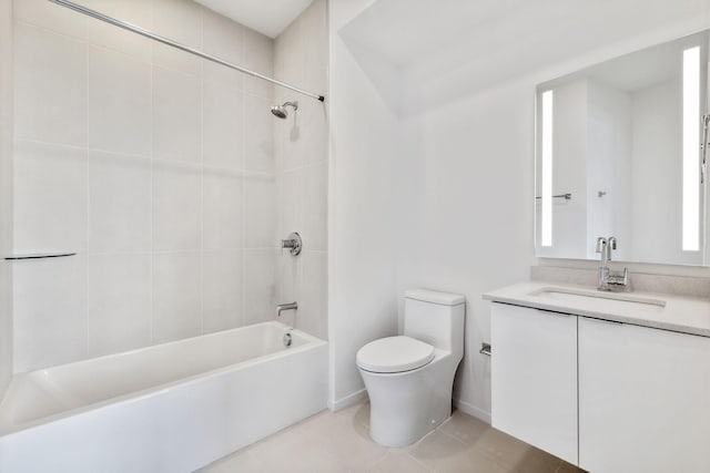 bathroom featuring tile patterned flooring, vanity, toilet, and shower / bathtub combination