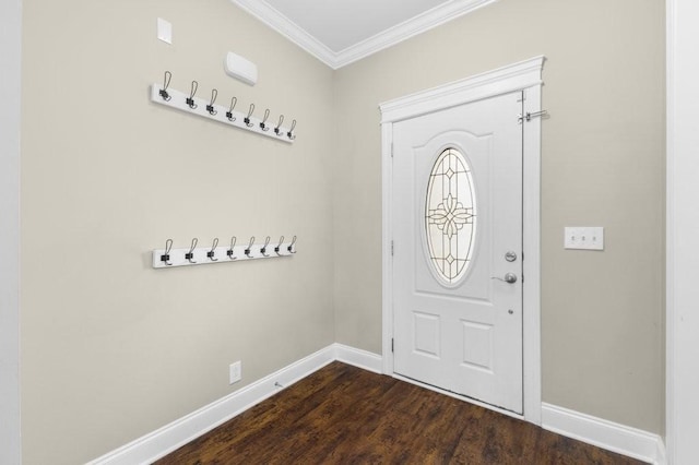 foyer entrance with dark wood-style floors, baseboards, and ornamental molding