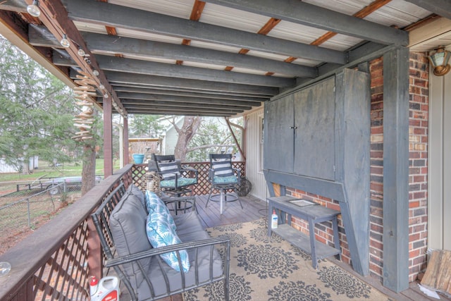 view of patio featuring fence