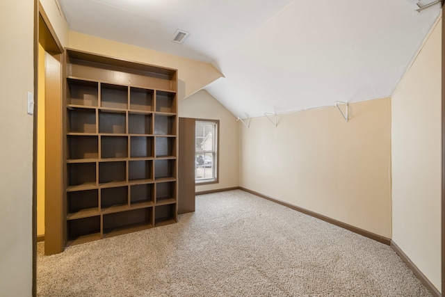 bonus room with visible vents, carpet flooring, baseboards, and lofted ceiling