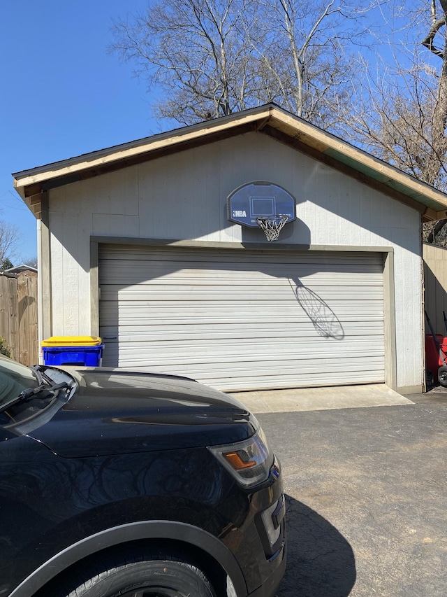 detached garage with fence