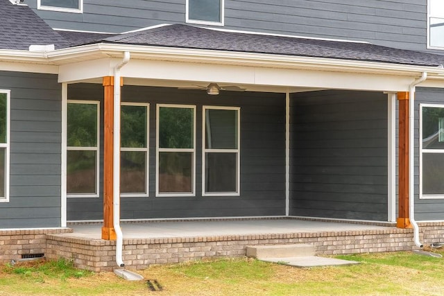 view of side of home featuring crawl space, brick siding, and a shingled roof