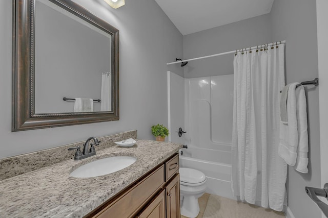 bathroom with shower / bath combo with shower curtain, toilet, and vanity