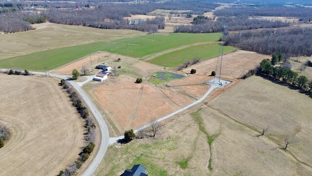 birds eye view of property featuring a rural view