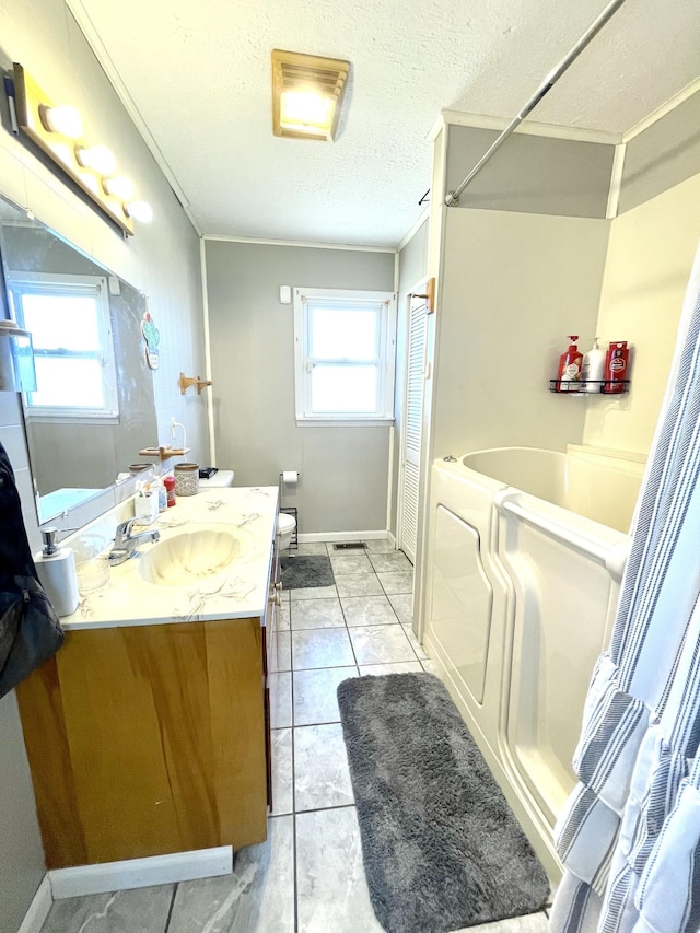 full bath with a shower with curtain, a textured ceiling, tile patterned flooring, a bath, and vanity