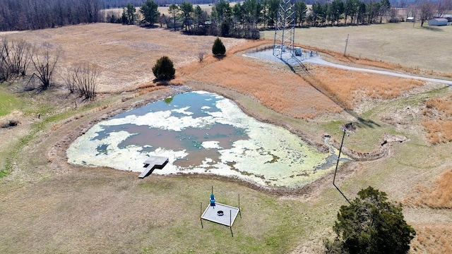 birds eye view of property with a rural view