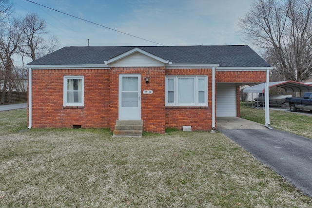 bungalow-style house with entry steps, a front yard, brick siding, and roof with shingles