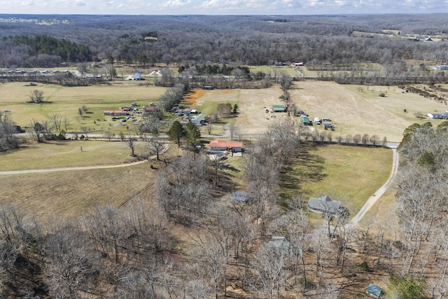 birds eye view of property with a rural view and a forest view