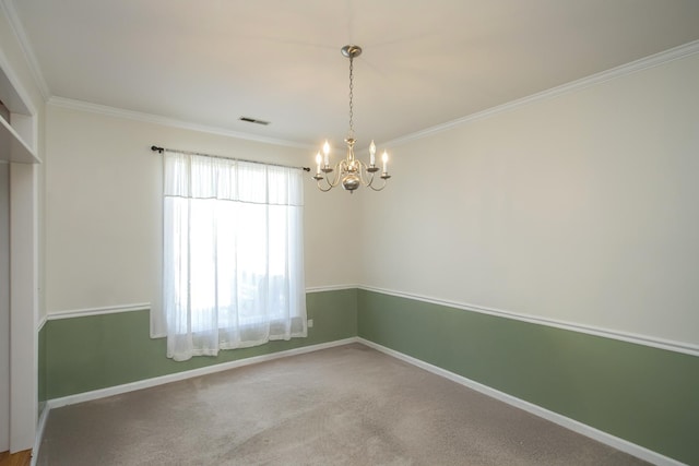 spare room featuring visible vents, baseboards, a notable chandelier, and crown molding