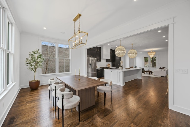 dining room featuring recessed lighting, a notable chandelier, dark wood-type flooring, and visible vents