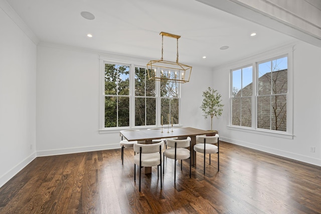 dining space with baseboards, recessed lighting, ornamental molding, dark wood-type flooring, and a notable chandelier