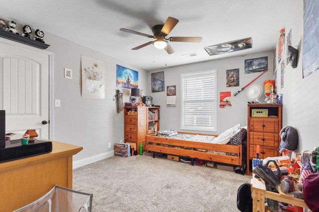 bedroom with visible vents, a ceiling fan, baseboards, and carpet floors