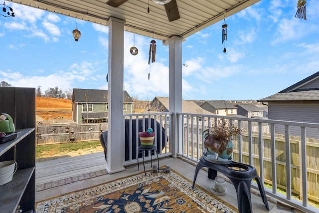 balcony featuring a ceiling fan