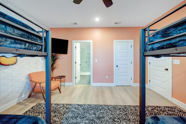 bedroom featuring visible vents, recessed lighting, wood finished floors, and baseboards