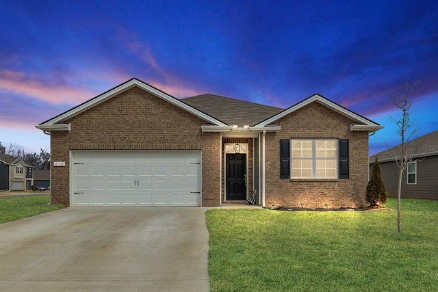 ranch-style home with brick siding, a front lawn, concrete driveway, and a garage