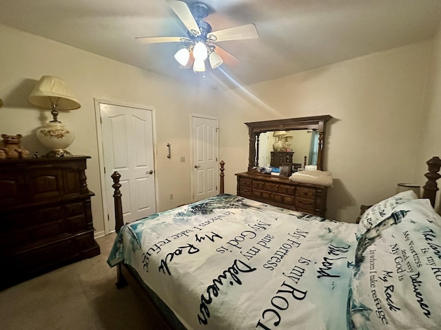 carpeted bedroom with a ceiling fan