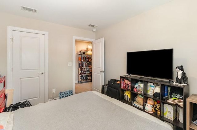 bedroom featuring visible vents