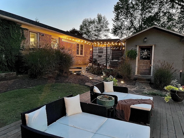 wooden deck with a yard