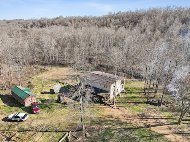 bird's eye view featuring a rural view and a forest view