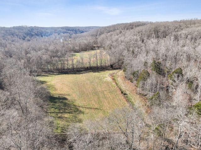 aerial view featuring a view of trees