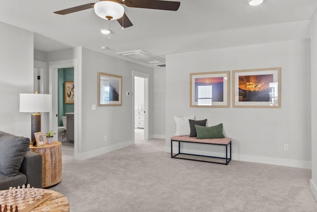 sitting room with a ceiling fan, recessed lighting, carpet, and baseboards