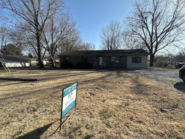 single story home with fence