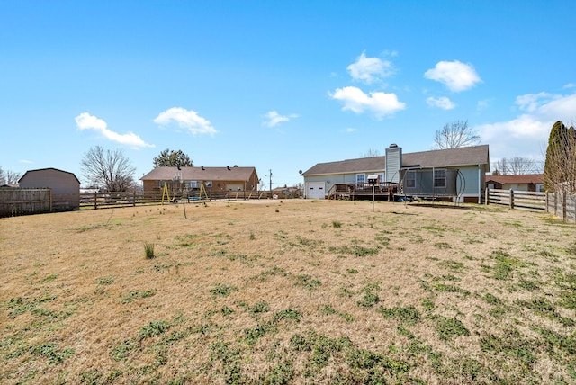 view of yard with fence