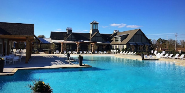 pool featuring a patio