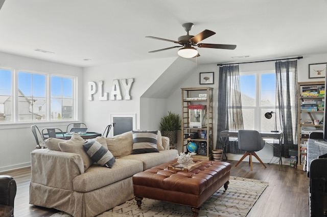 living room with a ceiling fan, wood finished floors, and an office area
